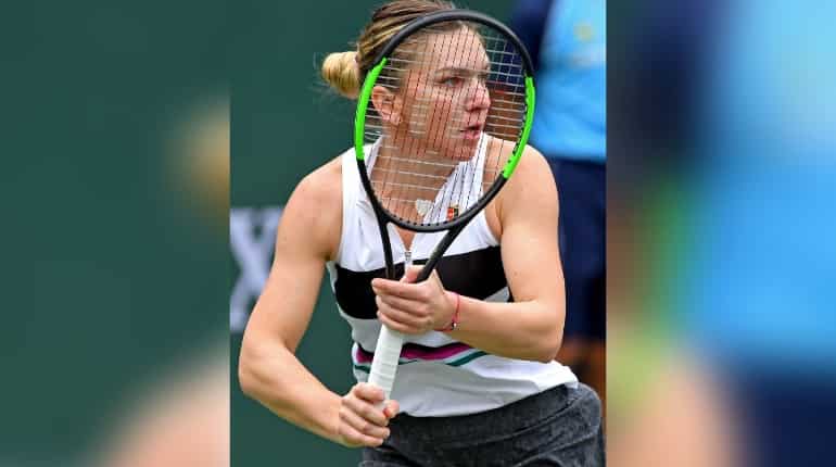 Defending champion Simona Halep shrugs off expectations ahead of French Open Defending champion Simona Halep shrugs off expectations ahead of French Open