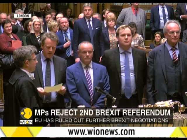 Britain's Parliament votes to delay Brexit deal