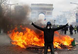 Paris police chief sacked after Champs-Elysees rioting