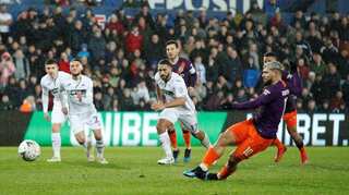 Premier League: Manchester City fight back to keep quadruple bid alive