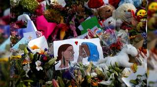 New Zealand begins to bury its dead after mosque massacre