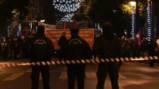 Greek police tear gas anti-vaxxers