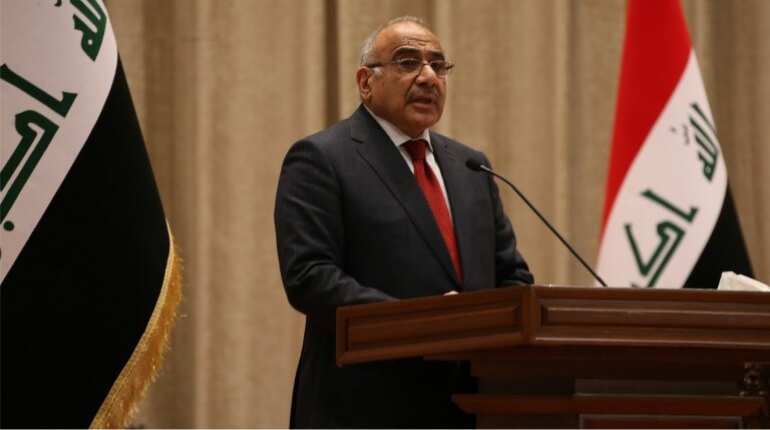 Iraq president vows early polls as protesters demand more