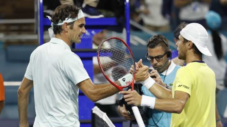 Roger Federer fights back to beat Radu Albot in Miami Open Roger Federer fights back to beat Radu Albot in Miami Open