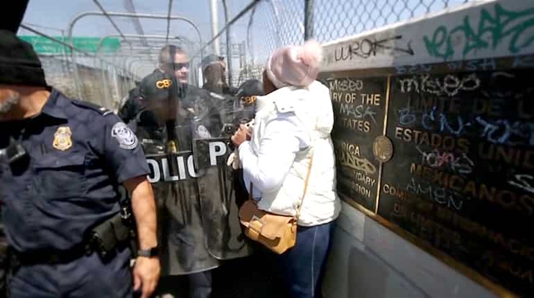 Cuban woman begs for asylum at Mexico-US border