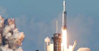 SpaceX Falcon Heavy rocket launches first commercial flight