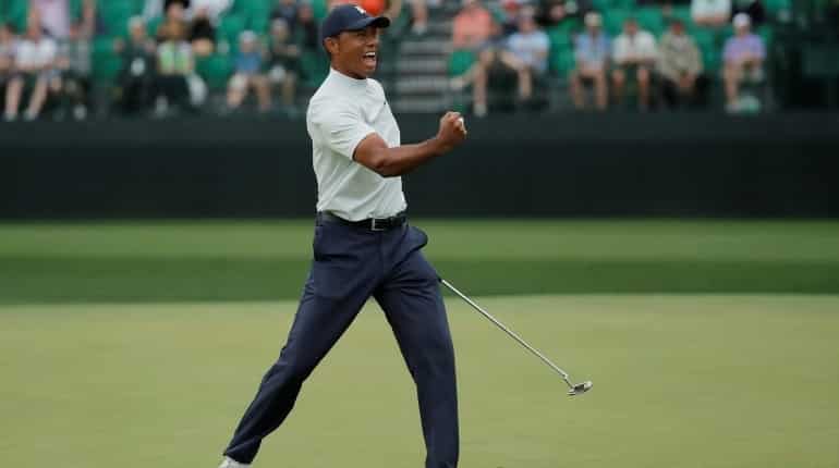 Roars return as Tiger Woods takes the Masters spotlight Roars return as Tiger Woods takes the Masters spotlight