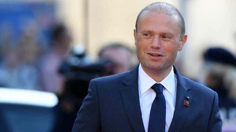 Malta's ruling party lawmakers back embattled prime minister