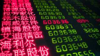 Global Markets: Asia stocks cling to nine-month high on China hopes, Wall Street dented by earnings