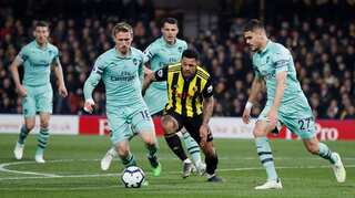 Freakish goal gives Arsenal 1-0 win at 10-man Watford