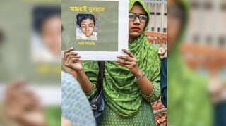 Bangladesh officer held for failing to probe teenager's grisly murder