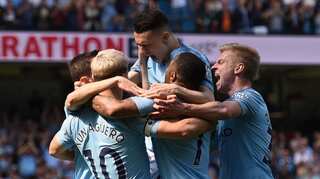Manchester City beat Tottenham 1-0 to go top of the Premier League