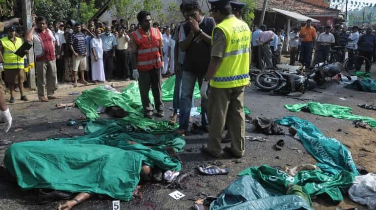 Several people covered in blood