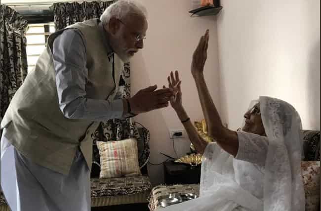 PM Modi meets his mother ahead of casting vote in Ahmedabad 