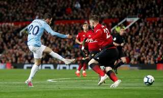 Manchester City take big step towards title with derby win at United
