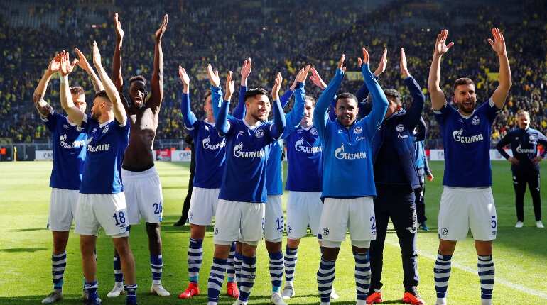 Dortmund's title hopes dented by shock home loss to Schalke Dortmund's title hopes dented by shock home loss to Schalke