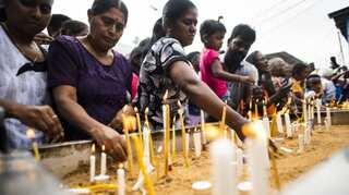Tears and troops on the streets as Sri Lanka mourns suicide bomb dead