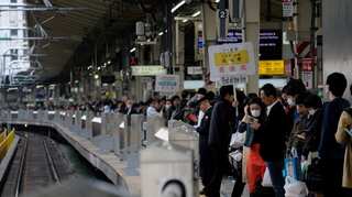 Extra abdication holidays pose dilemma for hardworking Japanese