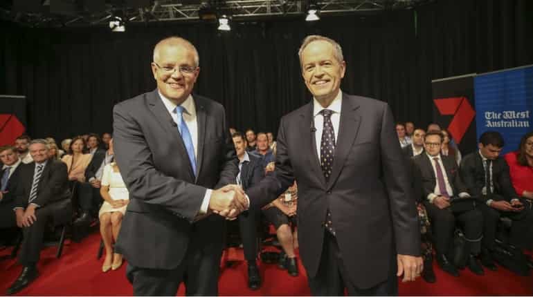 Australia holds feisty first election debate as race tightens Australia holds feisty first election debate as race tightens