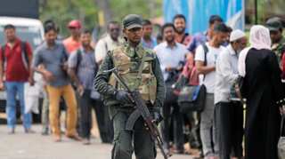 Sri Lanka imposes curfew in western coastal town after communal clashes