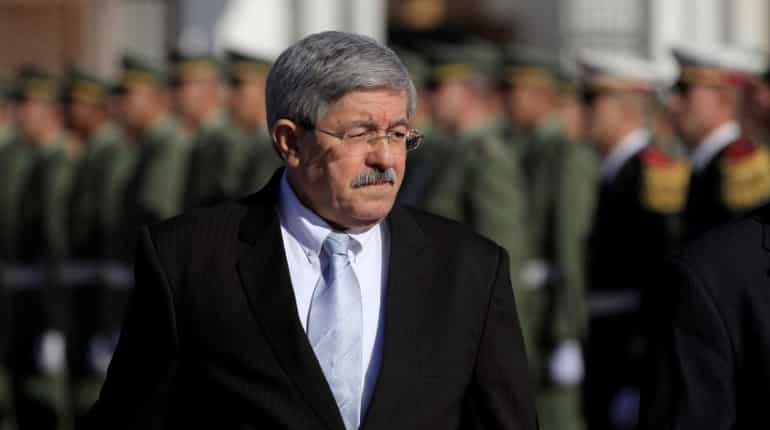 Algeria ex-PM questioned in widening probe into longtime elite