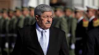 Algeria ex-PM questioned in widening probe into longtime elite