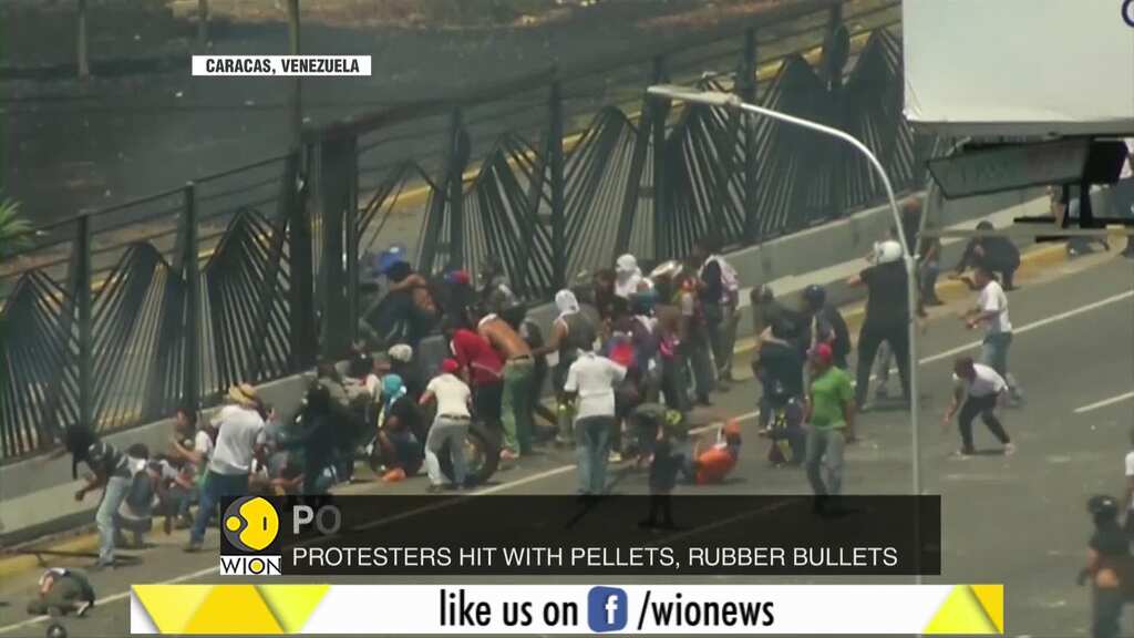Venezuela crisis: Violence rocks nation, Venezuelans take to the streets for Maduro uprising