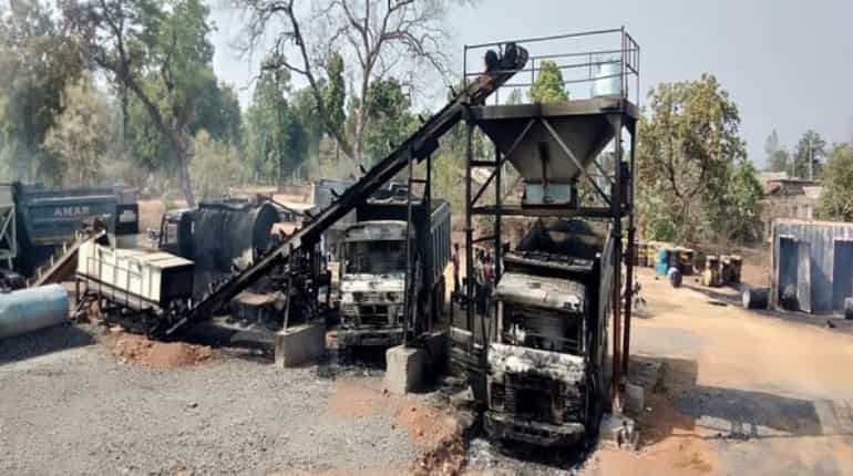 Naxals torch 25 vehicles of road construction company in Maharashtra's Gadchiroli district: Police Naxals torch 25 vehicles of road construction company in Maharashtra's Gadchiroli district: Police