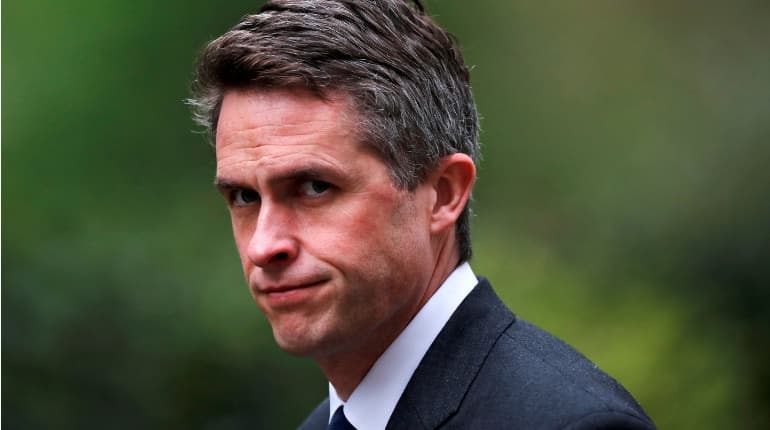UK PM Theresa May sacks defence minister Williamson over Huawei leak