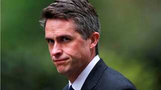 UK PM Theresa May sacks defence minister Williamson over Huawei leak