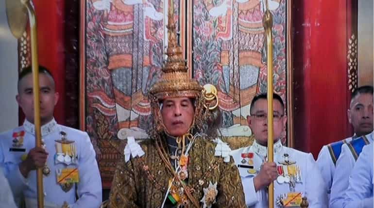 King Vajiralongkorn formally crowned Thailand's divine monarch, vows to 'reign with righteousness'