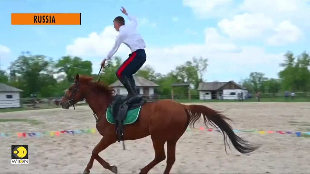 Swordplay on horseback - Russian cossacks show off traditional skills