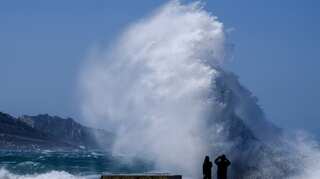 Two dead, one missing as freak weather hits Italy, France