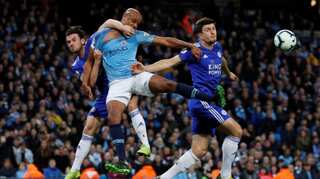 Kompany's stunner moves Manchester City close to Premier League title