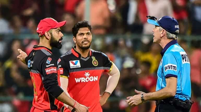 Umpire Nigel Llong pays for repairs after damaging glass door in Bengaluru stadium Umpire Nigel Llong pays for repairs after damaging glass door in Bengaluru stadium