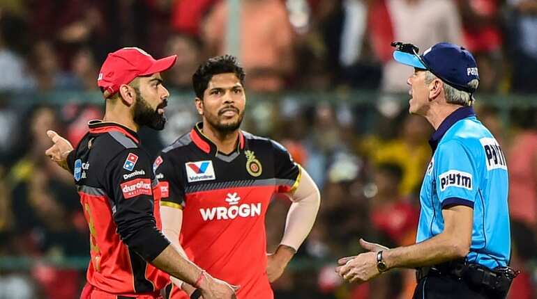 Umpire Nigel Llong pays for repairs after damaging glass door in Bengaluru stadium