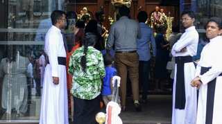 Sri Lanka's bombed church partially opens for prayers
