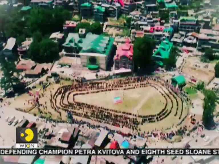 5000 women create record of ‘largest folk dance with voter cards'