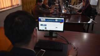 Taliban fighters double as reporters to wage Afghan digital war