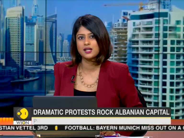 Albanian protesters hurl petrol bombs, seek snap polls