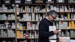 Crisis-hit Greeks foot steep bills for health and education
