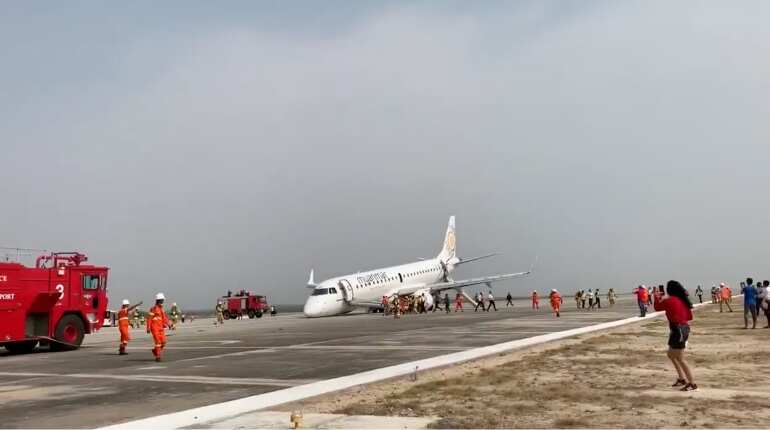Myanmar plane in emergency touchdown as landing gear fails Myanmar plane in emergency touchdown as landing gear fails