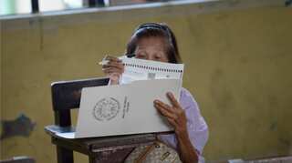 Philippines votes in polls expected to strengthen Duterte's grip on power