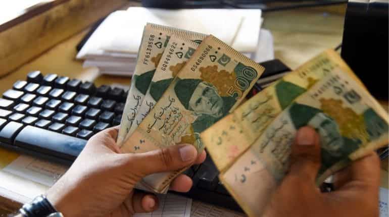 Post IMF bailout, Pakistan's currency reaches all-time low against US dollar