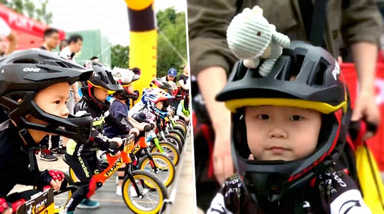 Young riders sprint on balance bike course in China