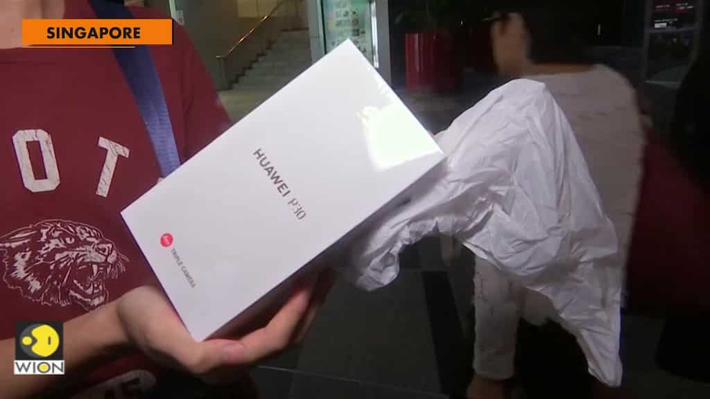 Singapore Huawei fan pounce on phone fears to buy on the cheap