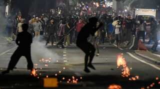Indonesian police arrest at least 20 amid post-election violence