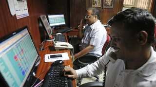 Sensex rallies by 413 points to scale new high, Nifty closes at 12,165