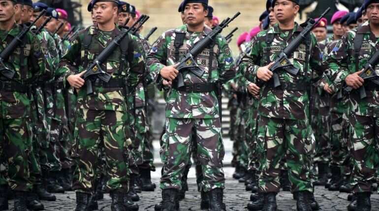 Indonesian troops flood Jakarta streets after post-election riots Indonesian troops flood Jakarta streets after post-election riots