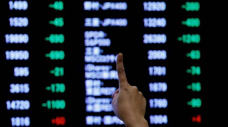 Japan leads Asian stocks amid AI surge; global markets await Central Bank decisions